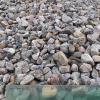 This 5/8" smooth stone is a nice bridge between pea stone and 1" Riverstone. It's a colourful blend of pinks, grey's and blue's. Suitable for ponds, pathways, and ground cover. Try it in your firepit!